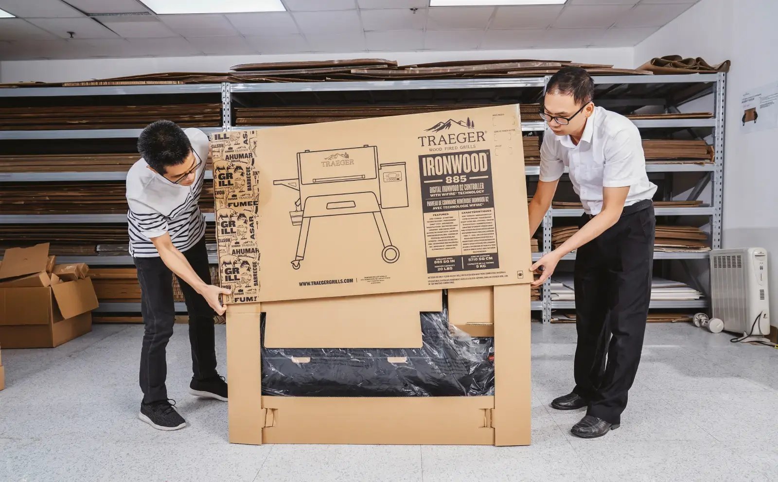 Workers assemble fun new Traeger Grills packaging